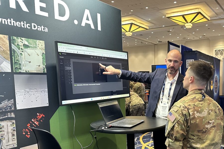 Rendered.ai's CEO, Nathan Kundtz, showcasing the capabilities of the company's synthetic data generation to a group of airmen at the 2024 Air, Space & Cyber Conference.